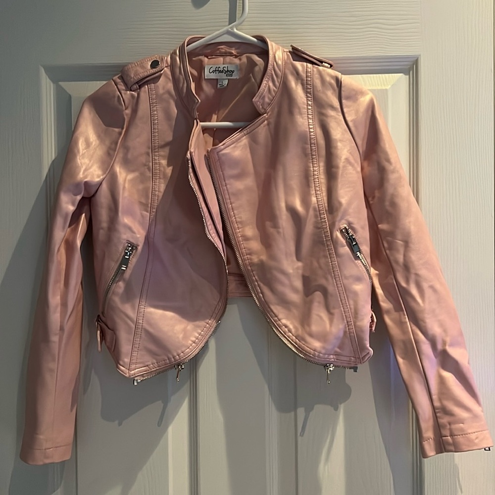 Faux leather youth jacket with zipper detailing.